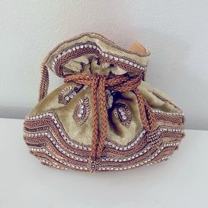 Gold Embellished Potli Bag in velvet with cut Dana work and diamond crystals